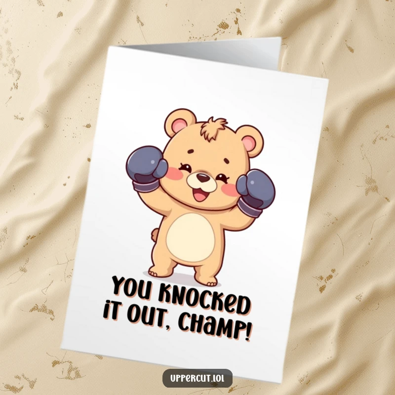 Funny Free Printable congratulations card: a happy bear cub in boxing gloves playfully jabs, celebrating achievement.