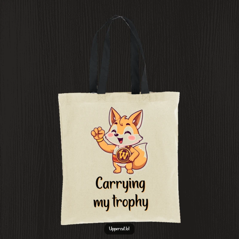 Funny fox champion tote bag showcasing a triumphant cartoon fox wearing a championship belt and raising a paw victoriously.
